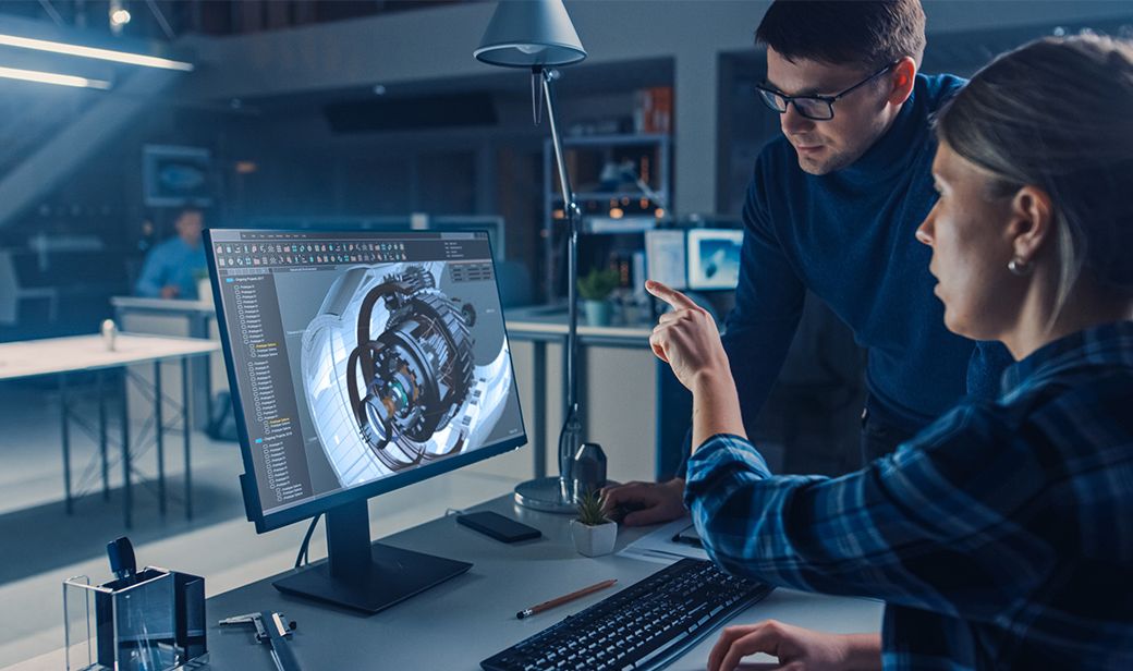 Man and woman working together on computer