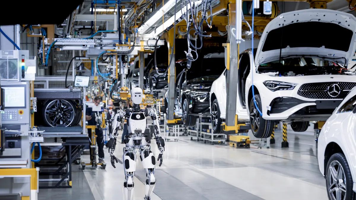 The Apollo robot shown on the floor of a Mercedes-Benz manufacturing facility.