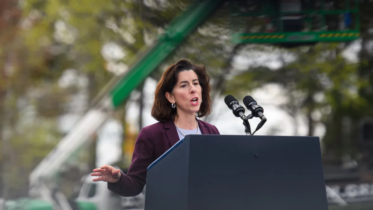 U.S. Secretary of Commerce, Gina Raimondo, addresses the crowd before U.S. President Joe Biden during a visit to Wolfspeed, a semiconductor manufacturer, as he kicks off his Investing in America Tour